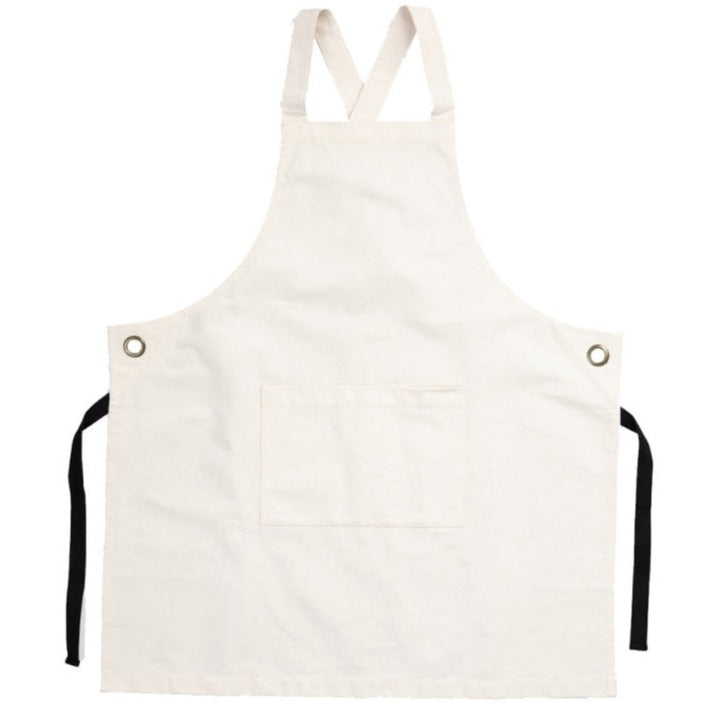 Natural heavy weight cafe style canvas apron. Blank or custom printed merchandise. Kindred Apparel Canada | Sustainable, ethical, organic and fair trade apparel
